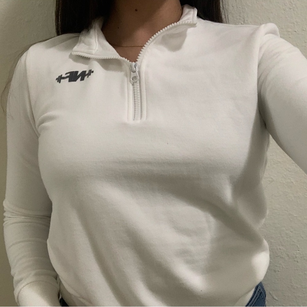 NF (Nasty Fit) White half-zip Sweater.